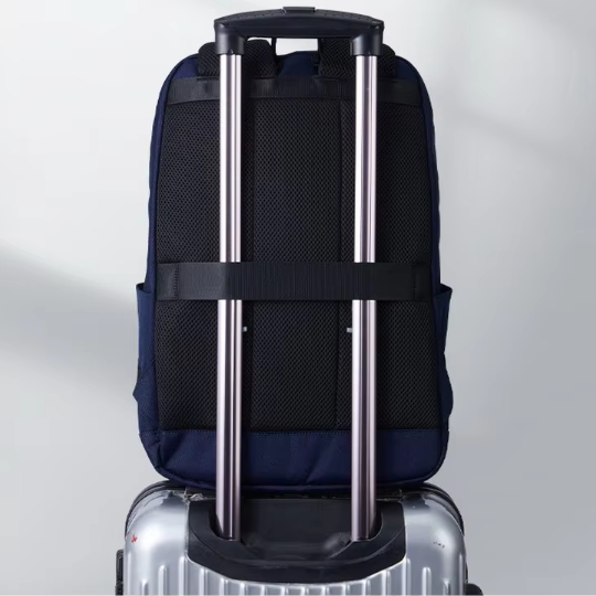 Side profile view of the black Lenovo Legion C1 backpack, highlighting its slim silhouette, top grab handle, and mesh-padded shoulder strap.