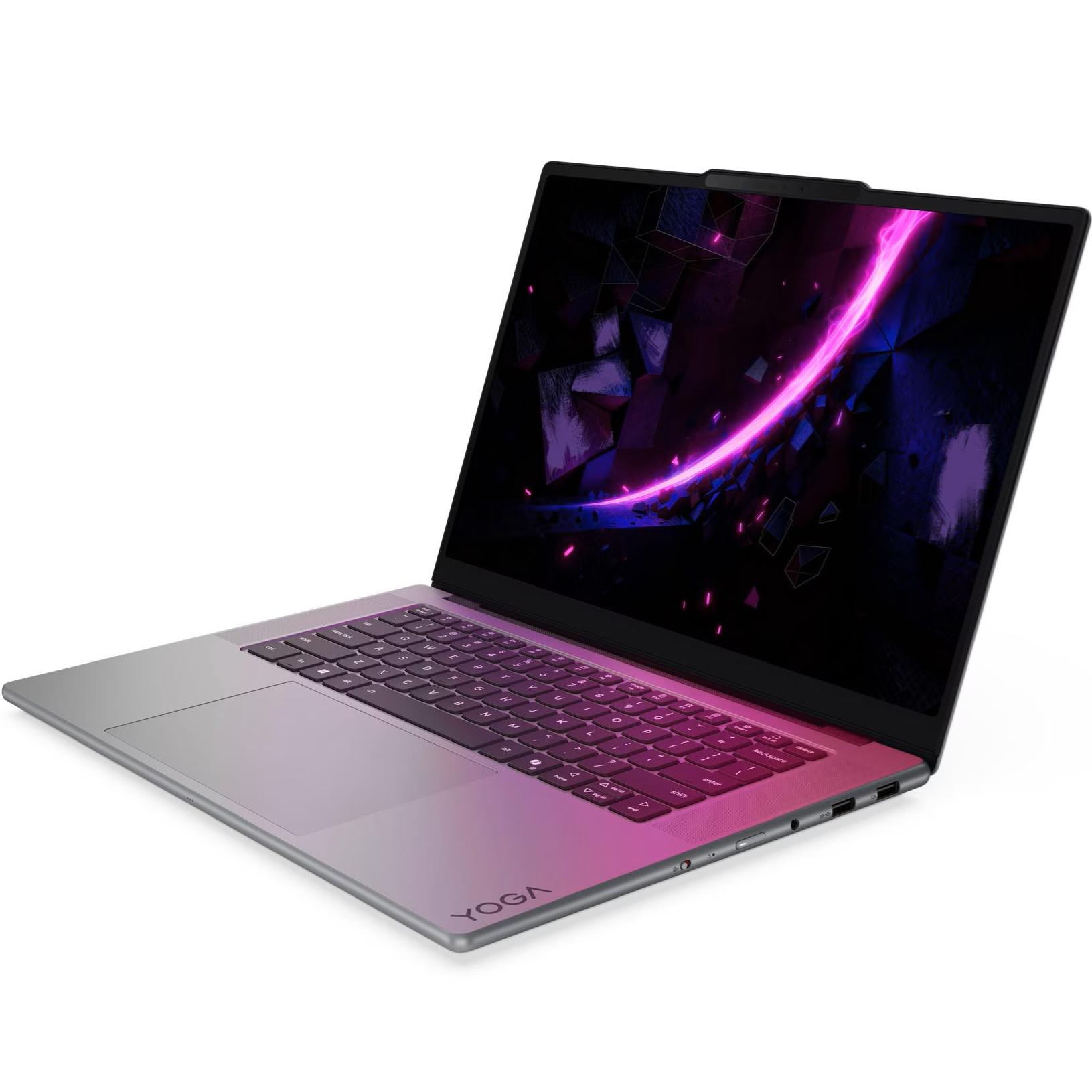 Angled front-facing perspective view of the Lenovo Yoga Pro 7 in metallic grey, featuring an illuminated keyboard deck, a spacious trackpad, and a vibrant display showcasing a dark geometric wallpaper slashed with a glowing pink light streak.