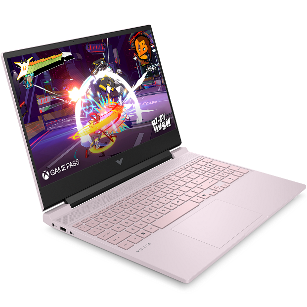Front-right angled perspective of the open HP Victus 15 laptop showing the screen displaying a video game scene alongside the pink keyboard and trackpad.