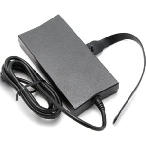 Top-down perspective of the matte black Dell 130W AC power adapter brick featuring its clean casing design, integrated output cable strain relief, coiled DC cord, and attached rubber retention strap.