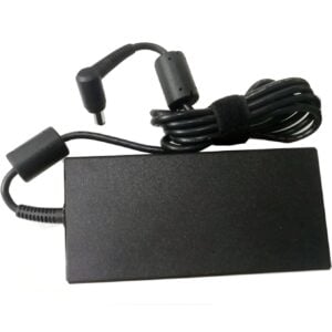 Top-side view of the black AC power adapter showing the clean, matte rectangular casing, the integrated output cable strain relief, and the coiled DC cord with a ferrite bead.