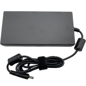 Top-side view of the black AC power brick showcasing the clean, matte rectangular casing surface, the integrated output cable strain relief, and the coiled DC cord.