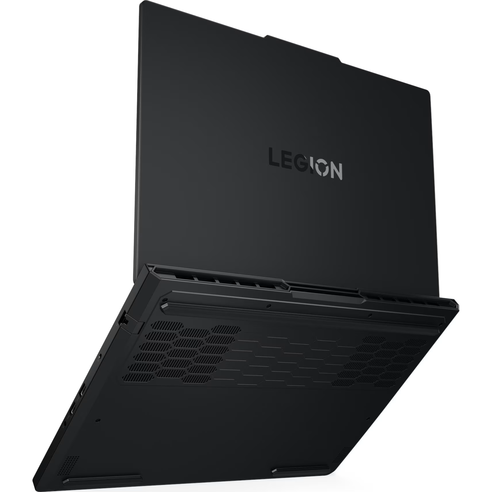 Low-angle rear perspective view of the dark chassis of the Lenovo Legion Pro 5i 16IAX10H showing the prominent metallic LEGION logo on the lid, rear thermal exhaust vents, and honeycomb intake ventilation grilles on the underside.