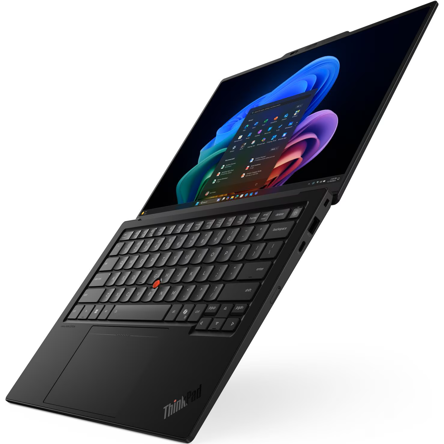 High-angle front-left perspective of the open Lenovo ThinkPad X1 Carbon Gen 14 AURA Edition displaying its iconic TrackPoint red nub, haptic touchpad, compact keyboard, and Windows 11 desktop on the 14-inch OLED display.