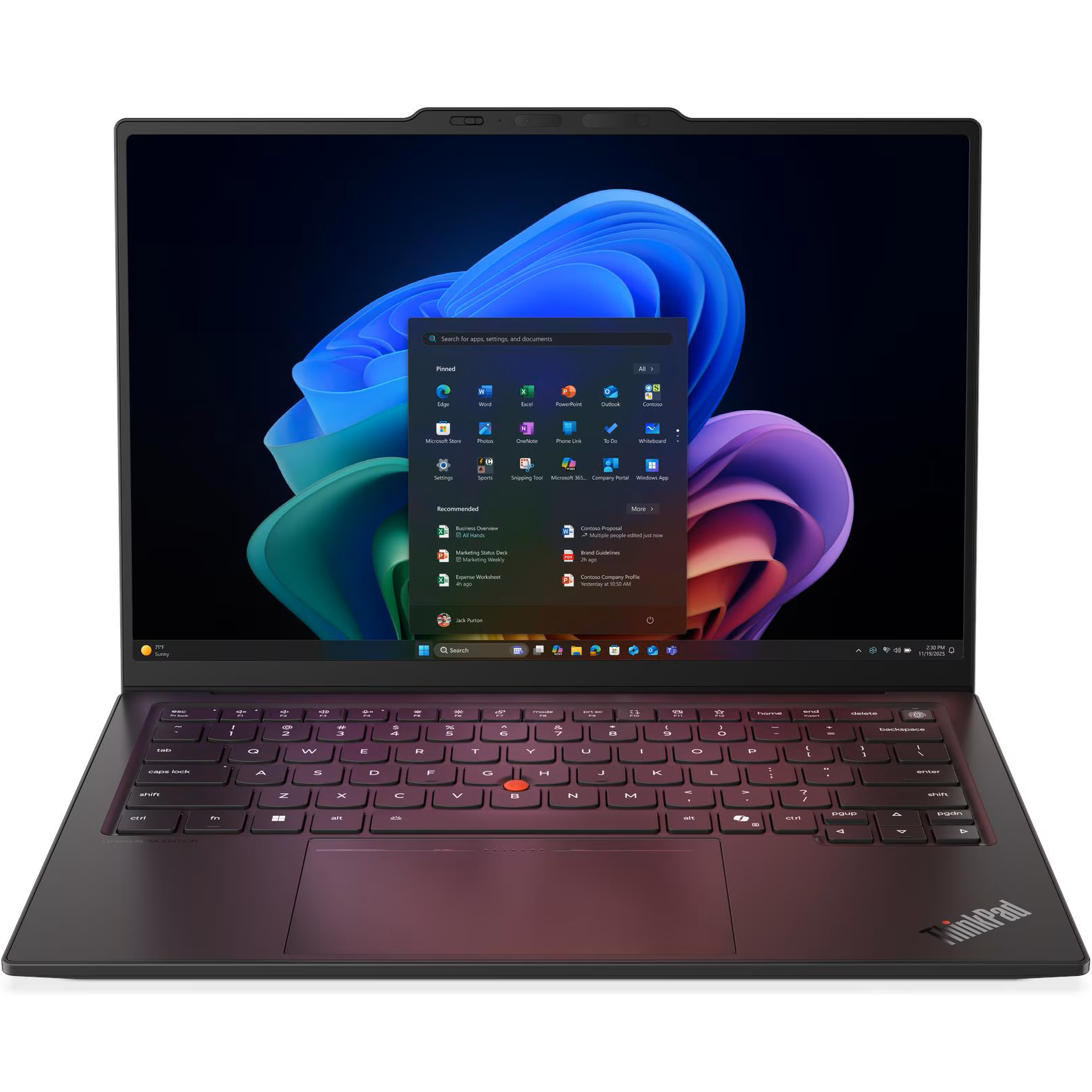 Direct front view of the open Lenovo ThinkPad X1 Carbon Gen 14 AURA Edition displaying Windows 11 on its 14-inch OLED panel, flanked by thin bezels and featuring the classic ThinkPad keyboard with TrackPoint.