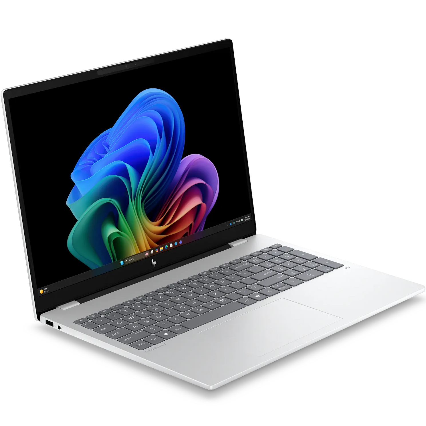 Front-right perspective view of the open convertible laptop, displaying the vibrant Windows setup screen on the 16-inch 2.8K OLED touchscreen.