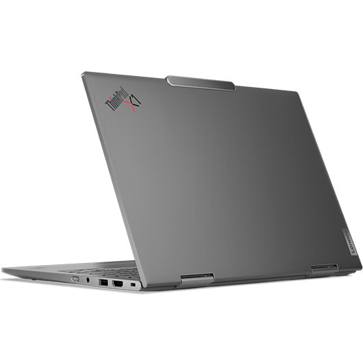 Rear-left angled view of the open storm grey Lenovo ThinkPad X1 2-in-1 Gen 10 AURA Edition showing its smooth aluminium lid with ThinkPad X1 corner branding, top Communications Bar, 360-degree convertible hinges, and right-side ports (3.5mm audio jack, USB Type-A, HDMI, and lock slot).